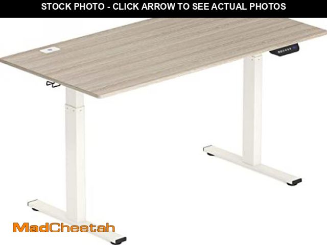 Lot 74-9442682 - SHW 55-Inch Large Electric Height Adjustable Standing Desk, 55 x 28 Inches, Maple - UNUSED