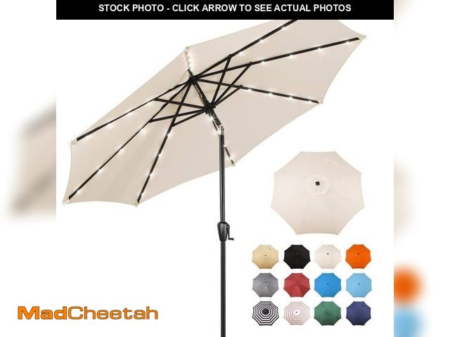 Lot 74-14246441 - Sun-Ray 9 ft. Steel Market Solar Lighted 8-Rib Round Patio Umbrella in Creamy Beige - UNUSED