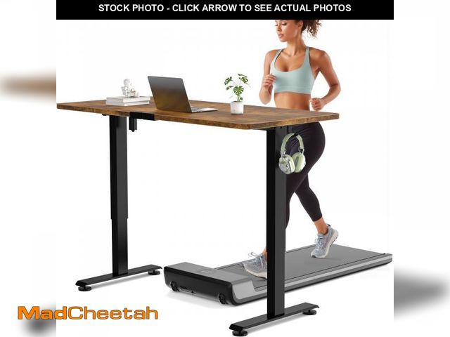Lot 74-12125779 - Veken 55 Inch Large Electric Standing Desk, 4 Memory Heights Adjustable,Sit to Stand Up, Work Home O...