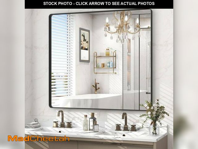 Lot 74-14112422 - KIOTEE 40 in. W. x 36 in. H Rectangular Framed French Cleat Wall Mounted Tempered Glass Bathroom Van...