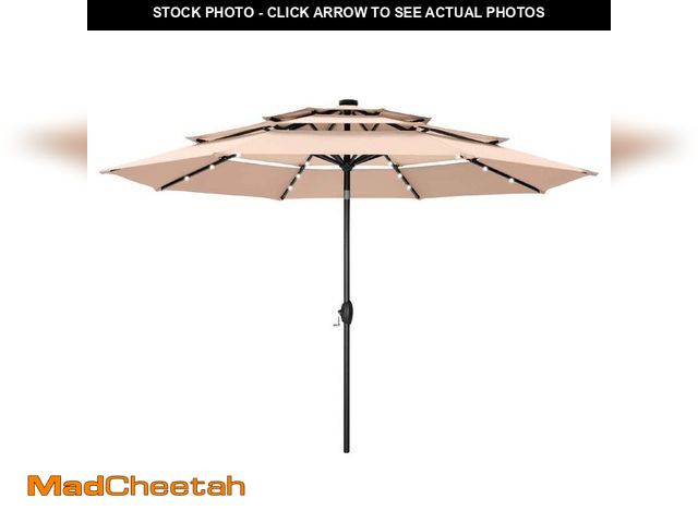 Lot 74-12465305 - PHI VILLA 10 ft. 3-Tier Patio Market Umbrella with Solar LED Lights AutoTilt and Crank in Beige - UN...
