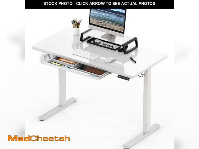 Lot 74-12167696 - SHW 48x24 Glass Electric Height Adjustable Standing Desk â Motorized Sit Stand Desk with Monitor R...