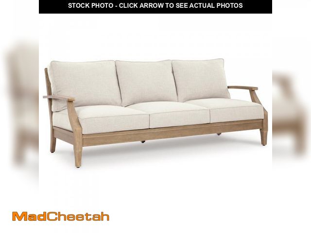 Lot 74-12483269 - Signature Design by Ashley Carter Hall Outdoor Eucalyptus Wood Patio Sofa Ã¢â¬â Cushioned with UV...