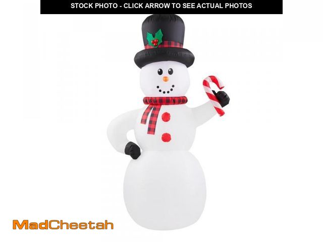 Lot 74-12410725 - SNOWMAN WITH CANDY CANE 6.5 FT AIRBLOWN INFLATABLE HOME ACCENTS - UNUSED