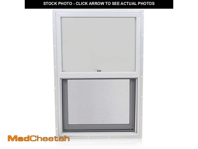 Lot 74-14355412 - (CRACKED) TAFCO WINDOWS 24 in. x 36 in. White Double-Pane Insulated Glass Vinyl Single Hung Window w...