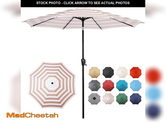 Lot 74-14278783 - Sun-Ray 9 ft. Round 8-Rib Steel Market Patio Umbrella in Beige and White Stripe - UNUSED