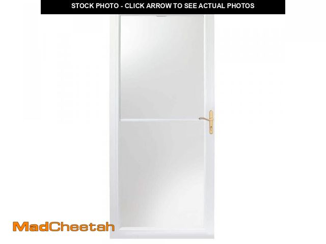 Lot 74-12519345 - Andersen 30 In. X 80 In. 2000 Series White Universal Self-Storing Aluminum Storm Door With Brass Har...