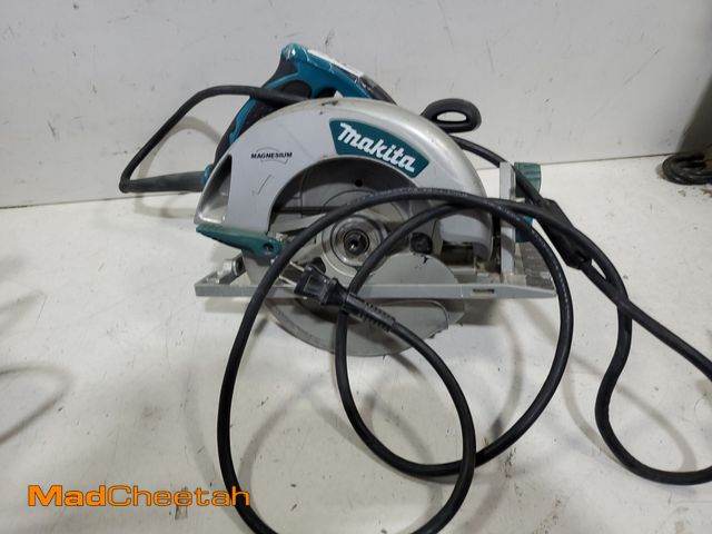 Lot 74-12672552 - (MISSING STORAGE CASE) Makita 15 Amp 7-1/4 in. Corded Lightweight Magnesium Circular Saw with LED Li...