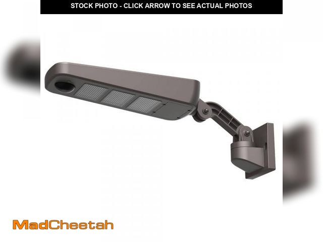 Lot 74-12411861 - Commercial Electric Solar Powered 4500 Lumens Bronze Motion Activated Dusk to Dawn Security Integrat...