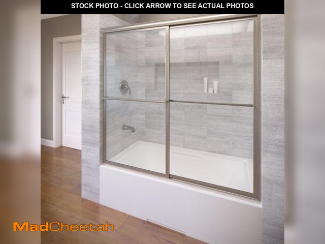 Lot 74-12200523 - Basco Deluxe Framed Sliding Tub Door, Fits 56-59 inch Opening, Clear Glass, Brushed Nickel Finish - ...