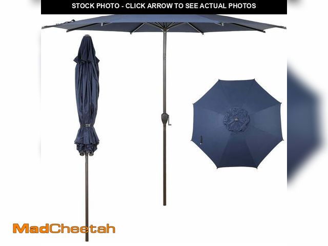 Lot 74-12679412 - Abba Patio 9ft Outdoor Patio Umbrella, Push Button Tilt &amp; Crank,  8 Ribs, Dark Blue - UNUSED