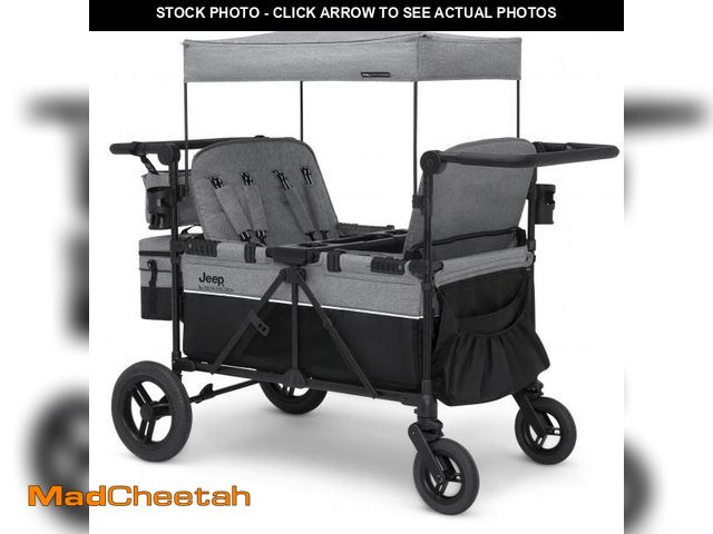 Lot 74-12104052 - Jeep Wrangler Deluxe 4 Seater Stroller Wagon by Delta Children - Premium Quad Stroller Wagon for 4 K...