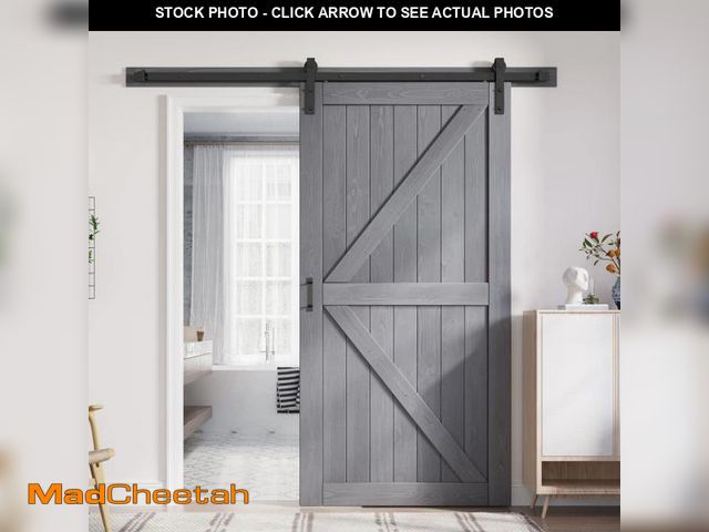 Lot 74-12132823 - FREDBECK 42in x 84in Gray Wood Barn Door Slab with 7ft (84inch) Barn Door Hardware Track Kit and Han...