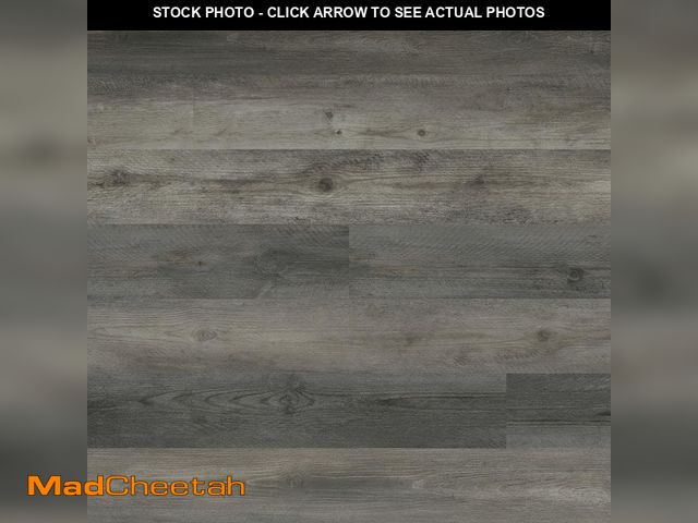 Lot 74-14447623 - Home Decorators Collection Pelican 12 MIL x 7 in. W x 48 in. L Waterproof Click Lock Luxury Vinyl Pl...