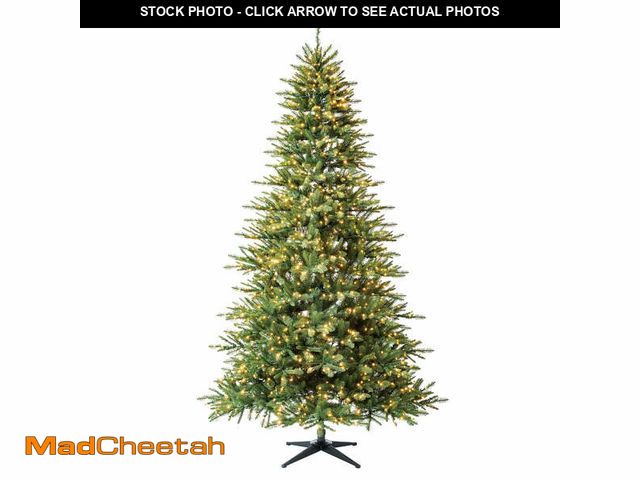 Lot 74-12982304 - 9' Pre-Lit Milford Pine Green Artificial Christmas Tree with LumaDazzle Color-Changing Twinkle LED L...