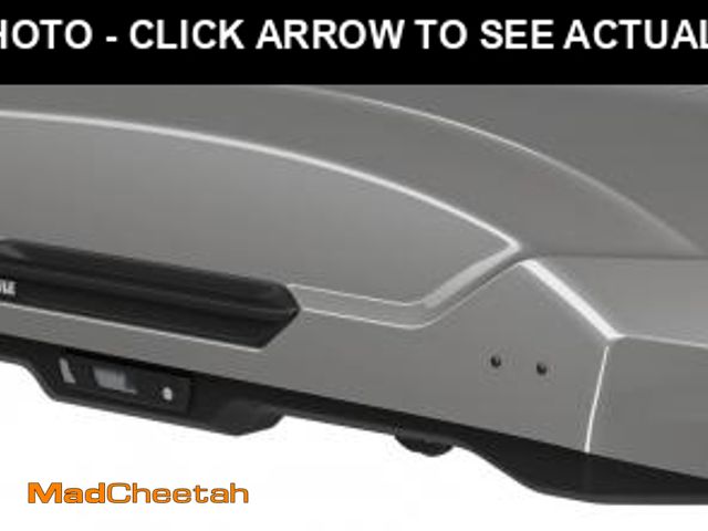 Lot 74-12164511 - (MISSING KEYS,) ( DENTED ,WILL NOT OPEN  ) Thule Motion 3 Roof Cargo Box, XXL, Titan - USED