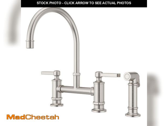 Lot 74-14311602 - Pfister Port Haven 2-Handle Bridge Kitchen Faucet with Side Sprayer in Stainless Steel - USED