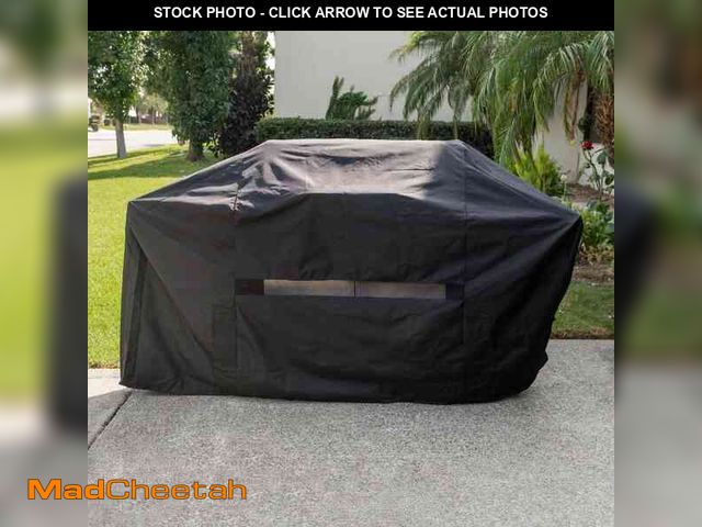 Lot 74-12731649 - *DIRTY* 4 Burner Premium Grill Cover 65in *DIRTY*  - USED