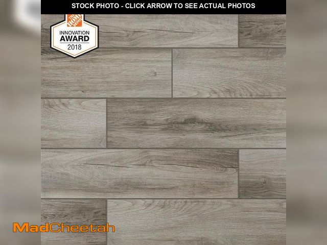 Lot 74-12299822 - (PALLET OF 8 BOXES) LifeProof Shadow Wood 6 in. x 24 in. Porcelain Floor and Wall Tile (116.4 sq. ft...