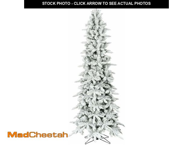 Lot 74-13041353 - Fraser Hill Farm 6.5-Ft Slim Mountain Pine Flocked Artificial Christmas Tree with Stand, Unlit Folda...