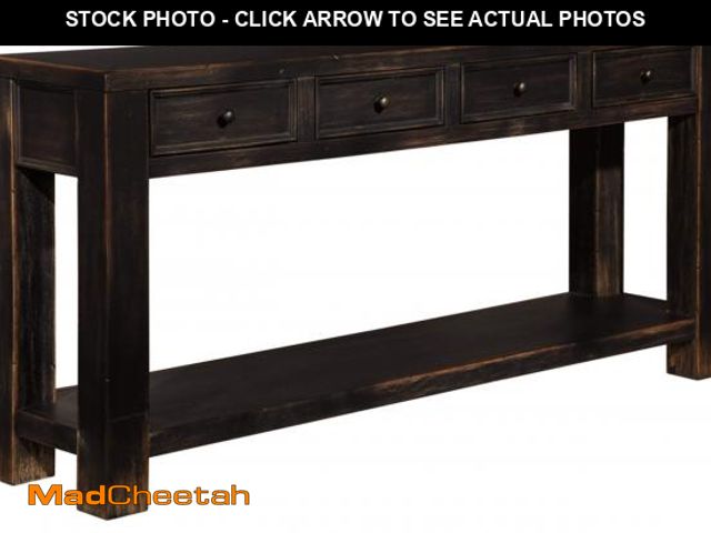 Lot 74-12174619 - Signature Design by Ashley Gavelston Rustic Sofa Table with 4 Drawers and Lower Shelf, Weathered Bla...