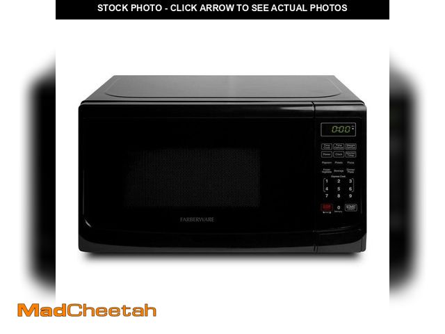Lot 74-12692262 - Farberware 0.7 cu. ft. 700-Watt Countertop Microwave Oven in Black - UNUSED