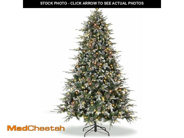 Lot 74-12781973 - 9 Foot Pre Lit Artificial Christmas Tree, Snow Flocked Norway Spruce with Warm White Lights, Include...