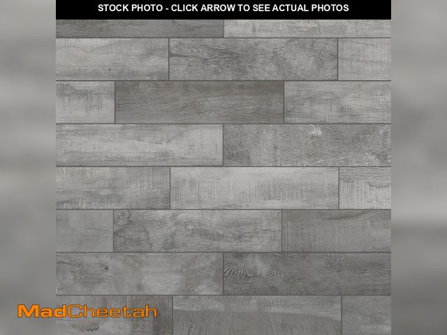 Lot 74-14278105 - Florida Tile Home Collection Wind River Grey 6 in. x 24 in. Porcelain Floor and Wall Tile (14 sq. ft...