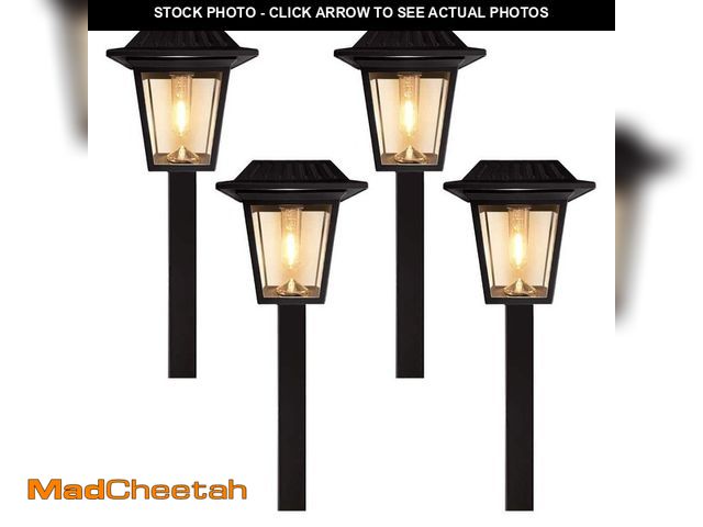 Lot 74-12775624 - Monteaux Lighting Black Integrated LED Outdoor Solar Pathway Lights with Clear Glass (4-Pack) - UNUS...