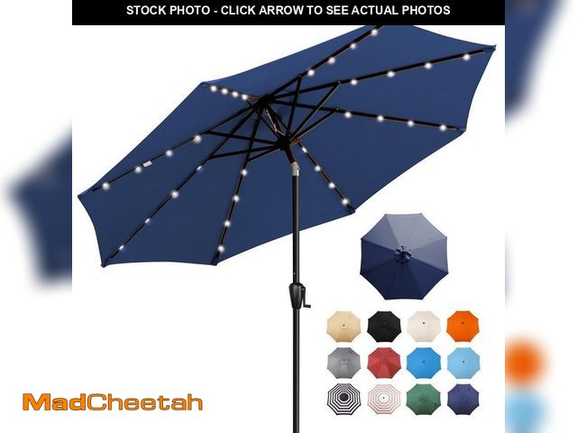 Lot 74-14589535 - Sun-Ray 9 ft. Steel Round Market Solar Lighted Patio Umbrella with 8-Rib, 32-LED in Navy 841008 (MIS...
