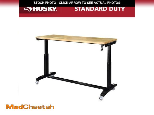 Lot 74-12548111 - Husky 62 in. W x 24 in. D Adjustable Height Black Workbench Table with Solid Wood Top - UNUSED