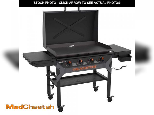 Lot 74-12026896 - Blackstone 4-Burner Liquid Propane Outdoor Griddle with Hood in Black - USED