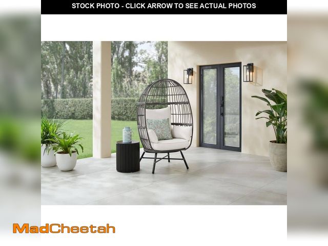 Lot 74-13738274 - Hampton Bay Breezy Bay Gray Wicker Outdoor Egg Chair with CushionGuard Almond Cushions - UNUSED