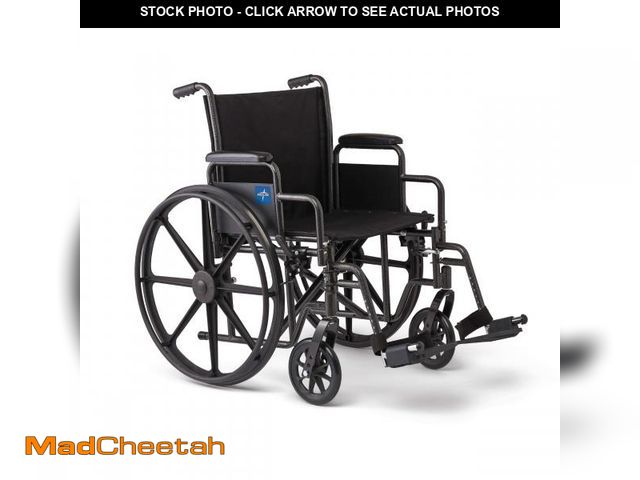 Lot 74-12232301 - Medline Comfortable Folding Wheelchair with Swing-Back Desk-Length Arms and Swing-Away Footrests, 18...