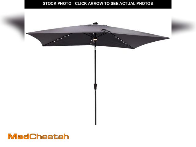 Lot 74-12249114 - C-Hopetree 6.5 x 10 ft Rectangular Outdoor Patio Market Table Umbrella with Solar LED Lights, Anthra...