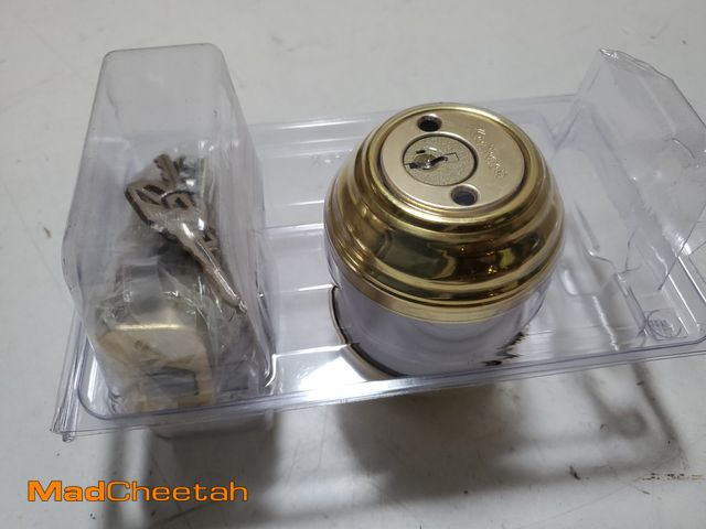 Lot 74-9510921 - Kwikset Polished Brass Double Cylinder Deadbolt featuring SmartKey Security - UNUSED