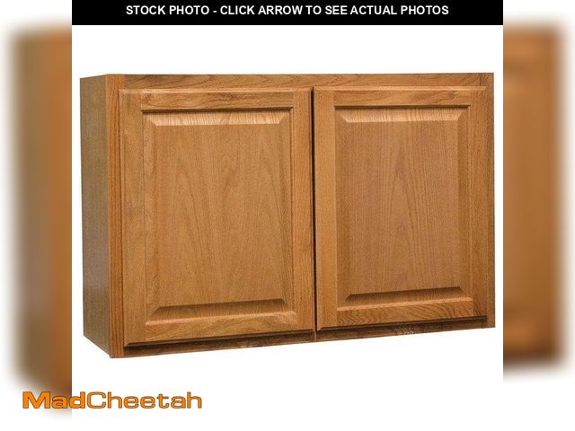 Lot 74-13796762 - Hampton Bay Hampton 36 in. W x 12 in. D x 24 in. H Assembled Wall Bridge Kitchen Cabinet in Medium O...