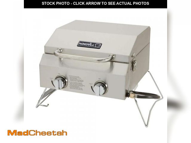 Lot 74-12463852 - (MISSING KNOBS) Nexgrill 2-Burner Portable Propane Gas Table Top Grill in Stainless Steel - USED