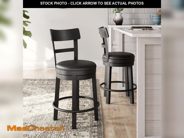 Lot 74-12519723 - Signature DESIGN BY ASHLEY Valebeck 24 in. Black Low Back Wood Bar Stool Upholstered Stool with Faux...