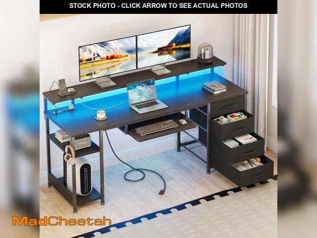 Lot 74-12889903 - 63 Inch Office Desk with Power Outlet and Adjustable Monitor Stand, Computer Desk with Fabric Drawer...