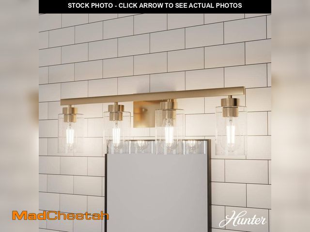 Lot 74-12830554 - Hunter Hartland 30.75 in. 4-Light Alturas Gold Vanity Light with Clear Seeded Glass Shades - UNUSED