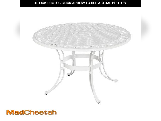 Lot 74-12557980 - HOMESTYLES Sanibel White 48 in. Round Cast Aluminum Outdoor Dining Table - UNUSED