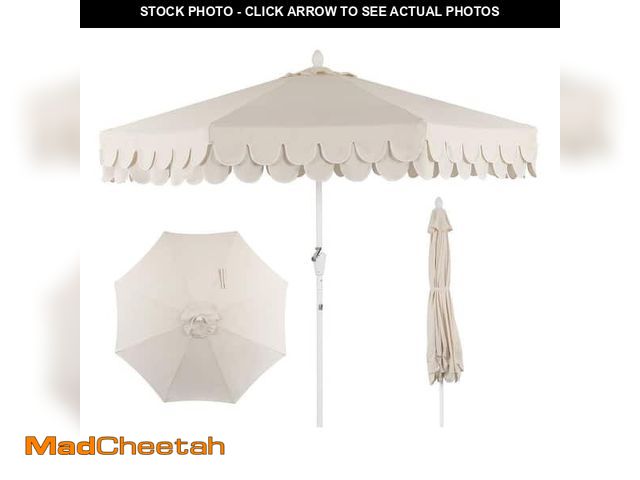 Lot 74-12663543 - JONATHAN Y Collins 9 ft. Tassel Market Patio Umbrella with Auto-Tilt, Crank, Wind Vent and UV Protec...