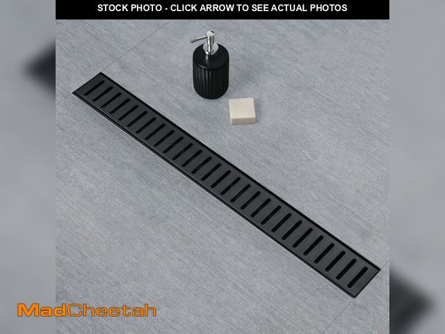 Lot 74-12863713 - SaniteModar Linear Shower Drain, 32 inch Black Shower Drain with Removable Capsule Pattern Grate,304...