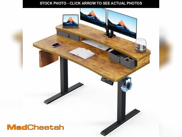 Lot 74-13090599 - HUANUO 48Ã¢â¬Â³ x 24Ã¢â¬Â³ Electric Standing Desk with 2 Drawers, C-Clamp Mount Compatible, Height...