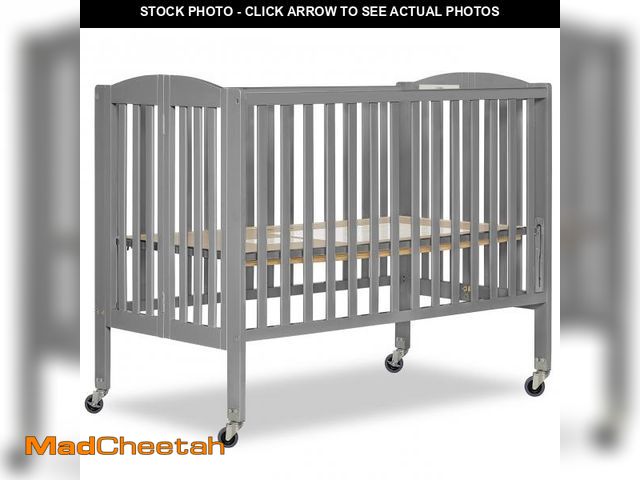 Lot 74-12105121 - Dream On Me Folding Full Size Convenience Crib In Storm Grey, Two Adjustable Mattress Height Positio...
