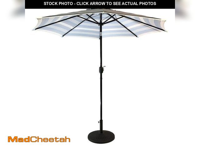 Lot 74-14291112 - Sun-Ray 9 ft. Steel Solar Lighted 8-Rib Round Market Patio Umbrella in Navy Striped - UNUSED