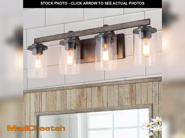 Lot 74-14223138 - LNC Birdwood 28 in. 4-Light Rust Gray Industrial Bathroom Vanity Light with Brushed Bronze Accents a...