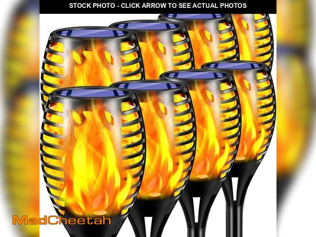 Lot 74-12460155 - TomCare 8 Pack Outdoor Flickering Flames Torch Decorative Garden Lights Solar Powered Waterproof Chr...