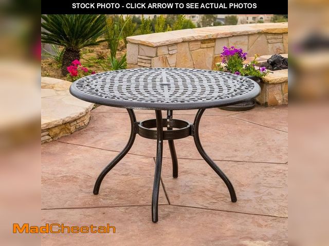 Lot 74-12659617 - Noble House Phoenix Hammered Bronze Round Aluminum  Outdoor Patio  Dining Table - UNUSED